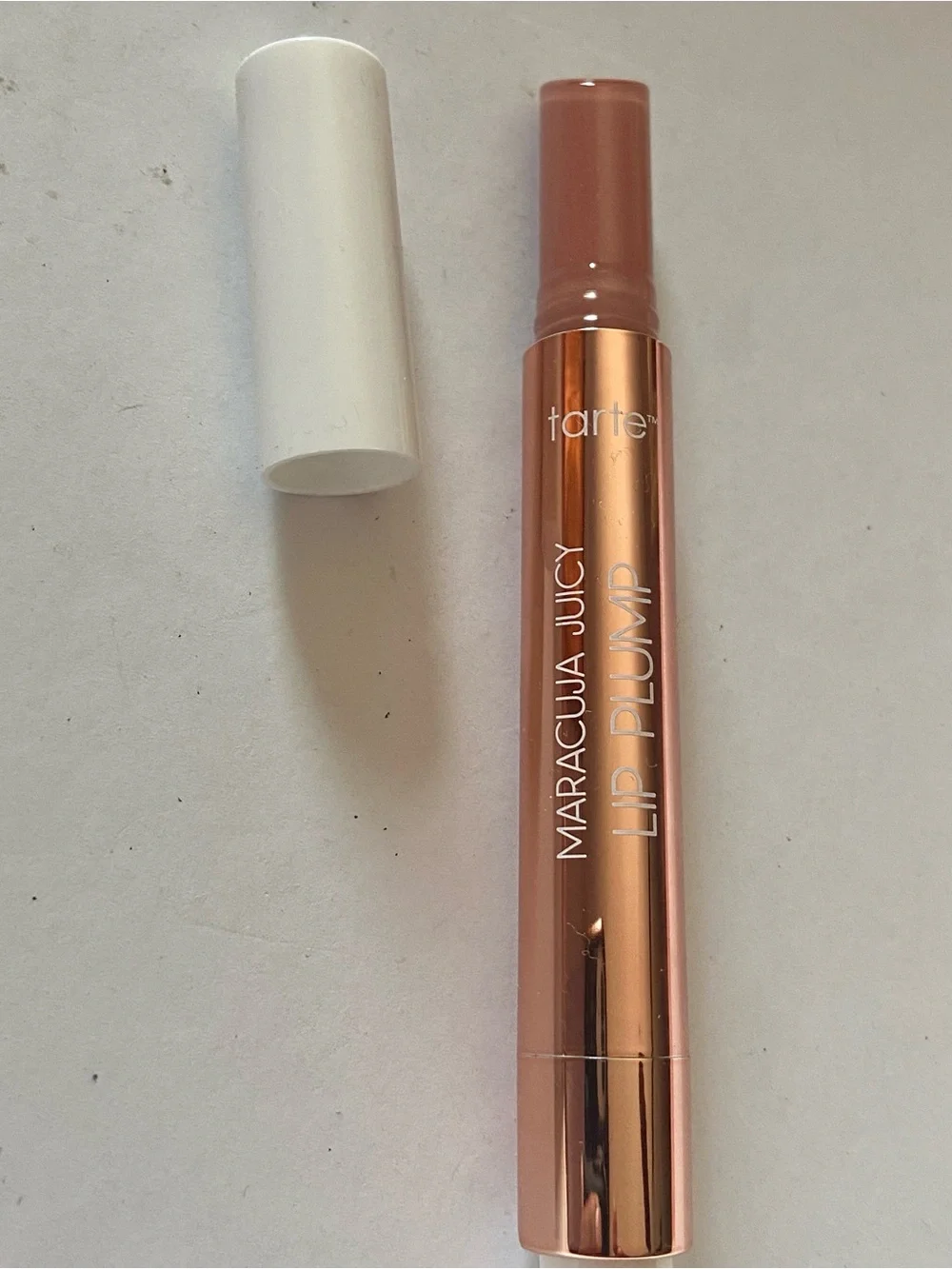 tarte Maracuja Juicy Lip Plump — glossy blushed pink